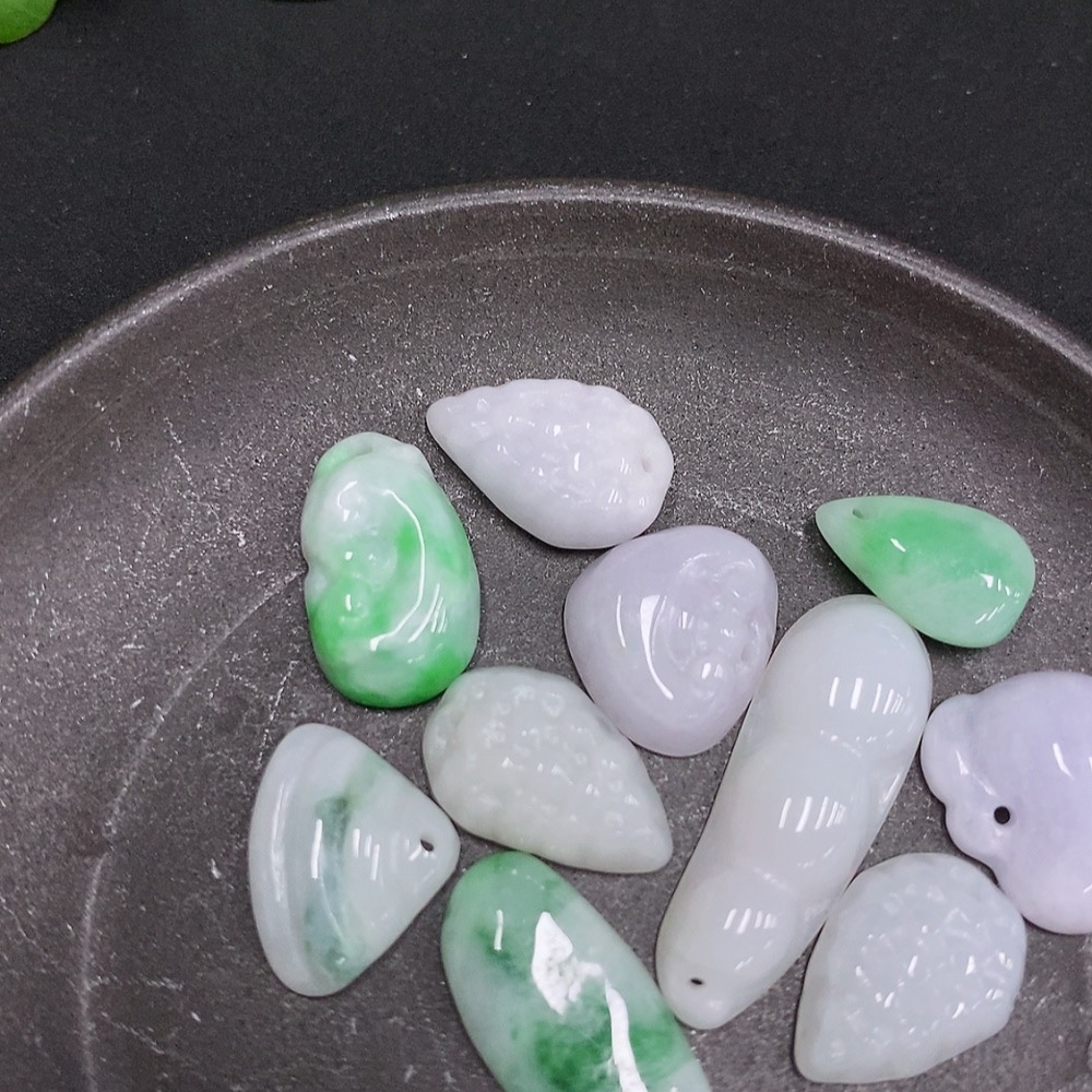 F33877446 Jadeite Pendants Sell as a Lot