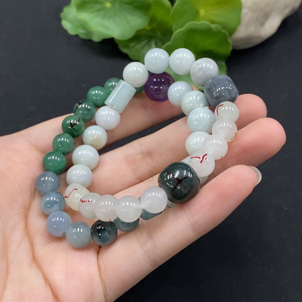 F35115044 Jadeite bracelet with non-A grade beads and impurity stones