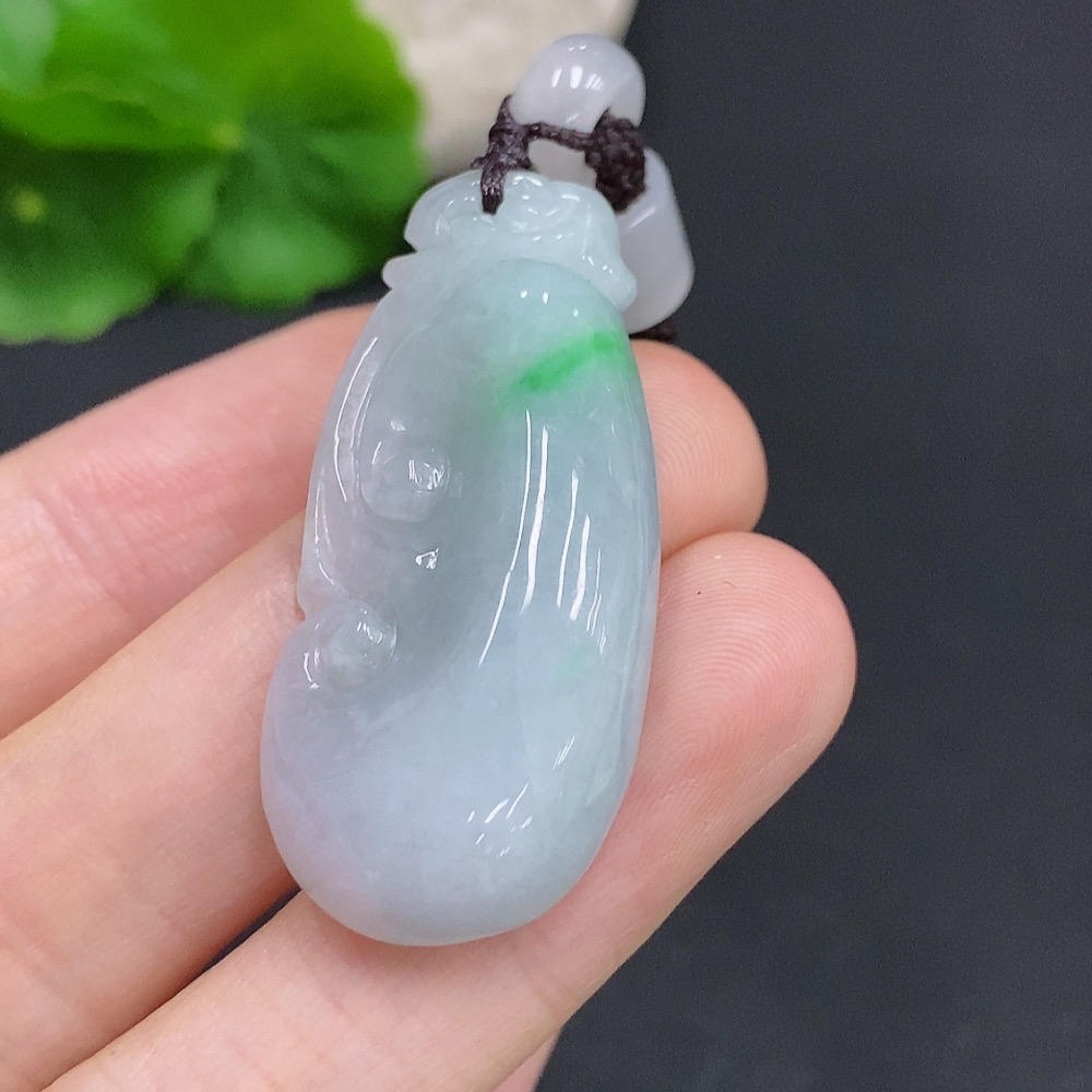 F33832095 Jadeite Ruyi Pendant Total weight approx. 13.4g (including cord weight) Matching beads not jadeite