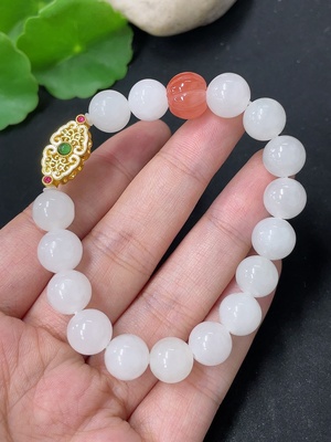 H46574517 和田玉手串    卡9.5mm左右   非金   货品总重约23.9g   含其他矿物成份  配珠非和田玉