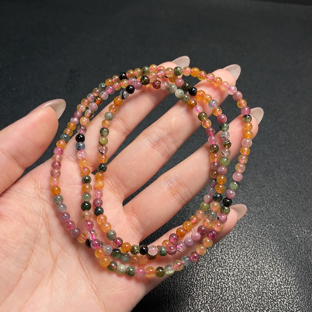 C34008843 Tourmaline bead strand with other mineral components, visible organic matter, total weight approx. 17.98g, size approx. 3.9mm