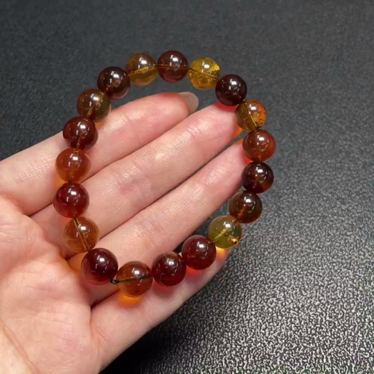 C29403695 Amber Beeswax Bracelet, approx. 9.9mm, total weight approx. 10.53g