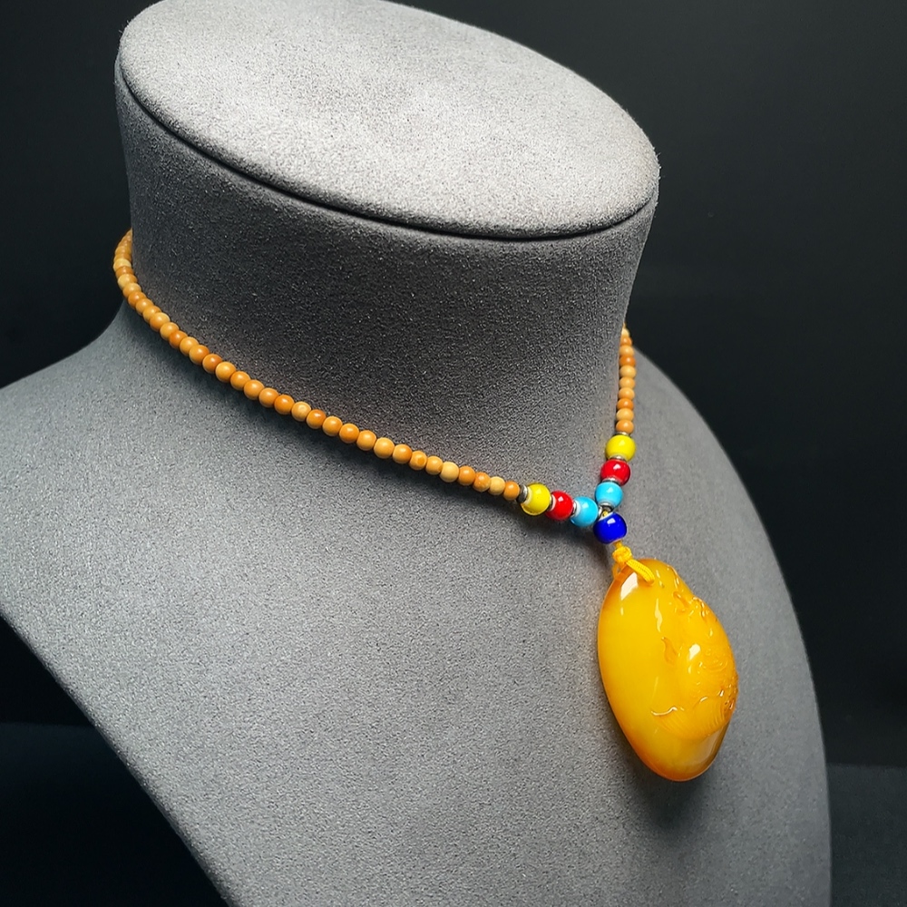 C34066888 Amber Beeswax Pendant with Colorless Coating, Total Weight Approx. 16.50g Including Chain, Chain Not Natural