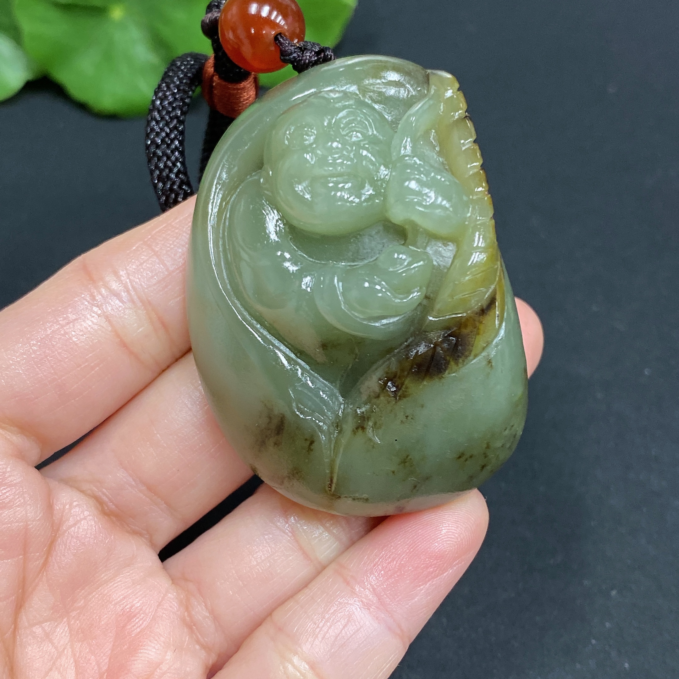 H25872096 Hetian Jade Handheld Ornament - Boy; Total Weight (Including Rope): Approx. 78.7g; Undetermined Skin Color Origin