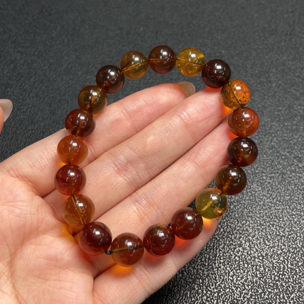 C29403695 Amber Beeswax Bracelet, approx. 9.9mm, total weight approx. 10.53g