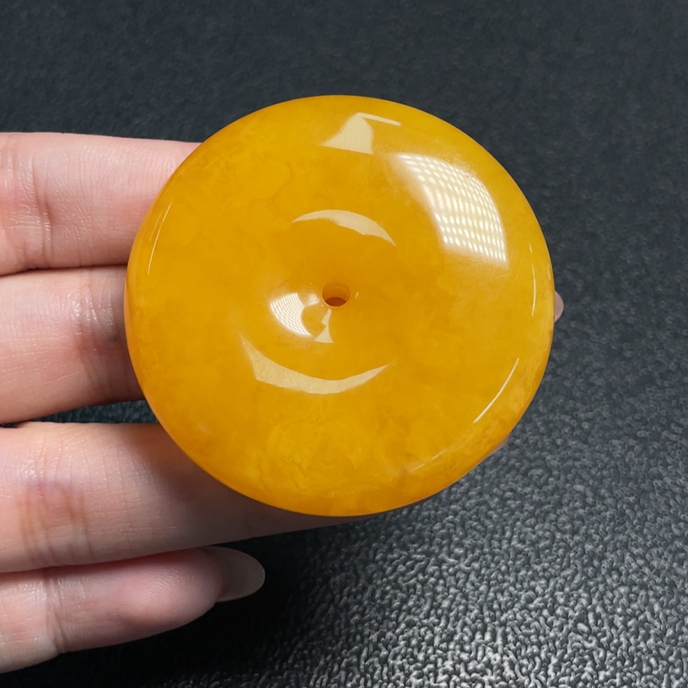 C34009607 Amber Beeswax Pendant with a total weight of approximately 17.71 grams