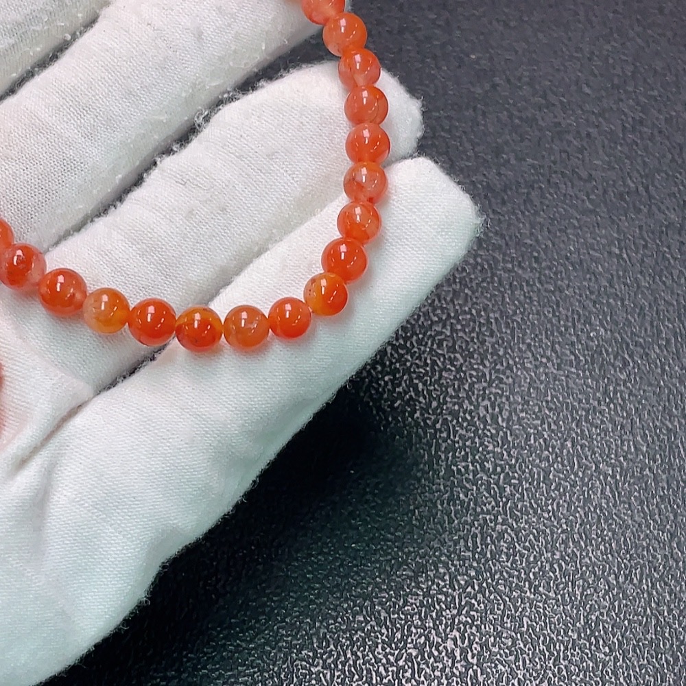 C34990444 South Red Agate Bracelet with Hetian Jade + Amber Beeswax, Non-Gold, Organic Matter Visible, Total Weight Approx. 16.75g, Sell as a Lot