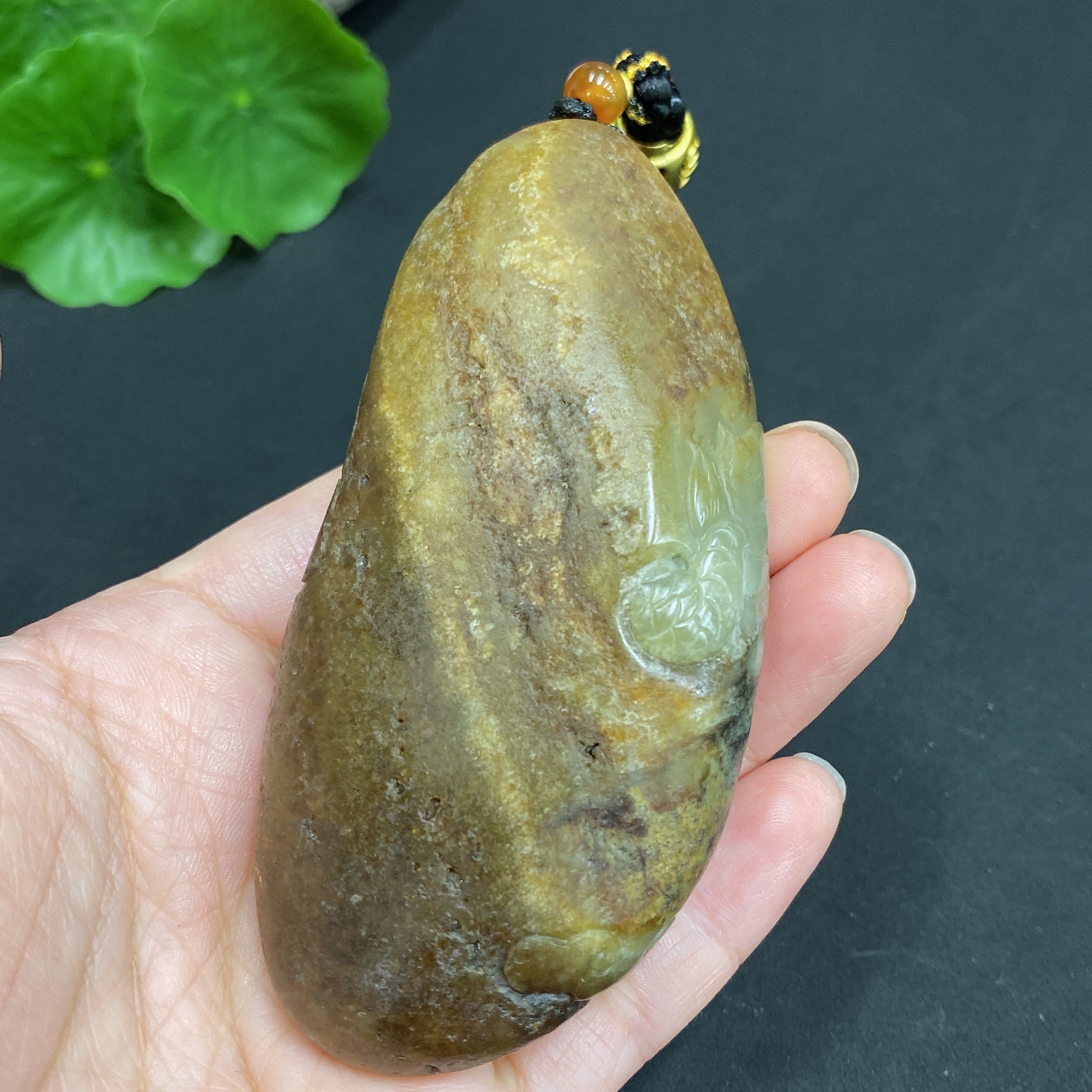 H22439310 Hetian Jade Pendant  Dragon  Total Weight (including rope) 139.7g  Undetermined skin color origin  Contains other natural mineral components