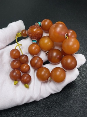 C43161147 琥珀蜜蜡珠串  配石考虑非天然  货品总重约68.68克  卡12.5-24.4mm左右