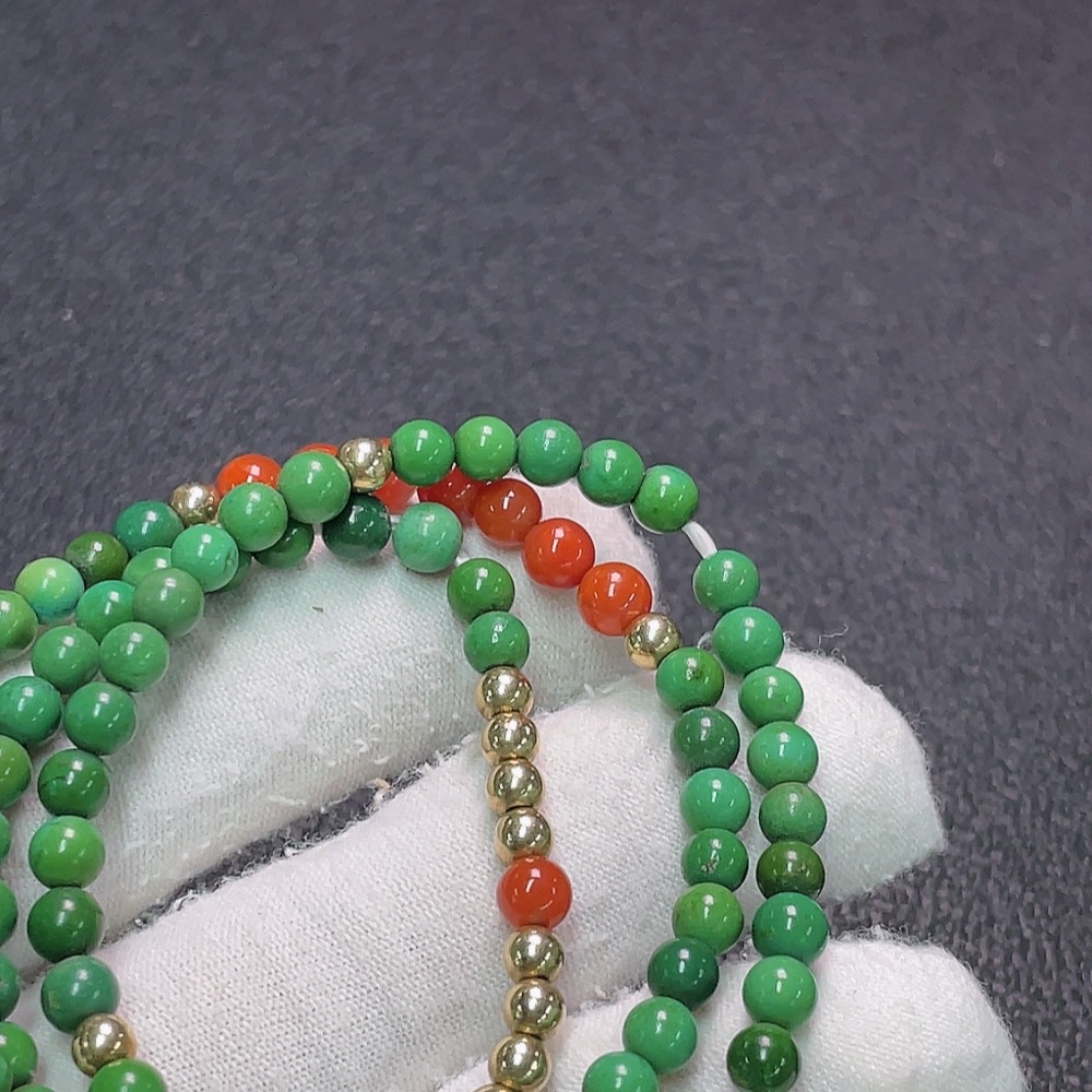 C33922751 Turquoise bead strand with amber and southern red agate, color origin undetermined, containing other mineral components, non-gold, total weight approximately 17.37g, bead size about 4.4mm