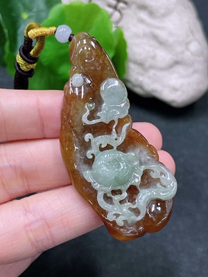 F33838640 Jadeite Pendant, color origin undetermined, total weight including string approx. 25.65g