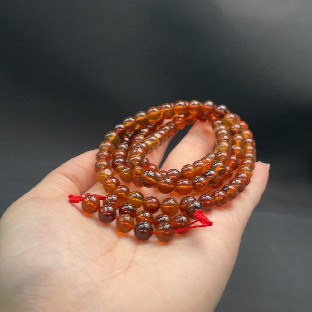 C16760810 Amber Beeswax Bead Strand Approx. 24.36g 7.3mm