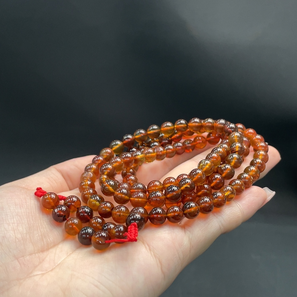 C16760810 Amber Beeswax Bead Strand Approx. 24.36g 7.3mm