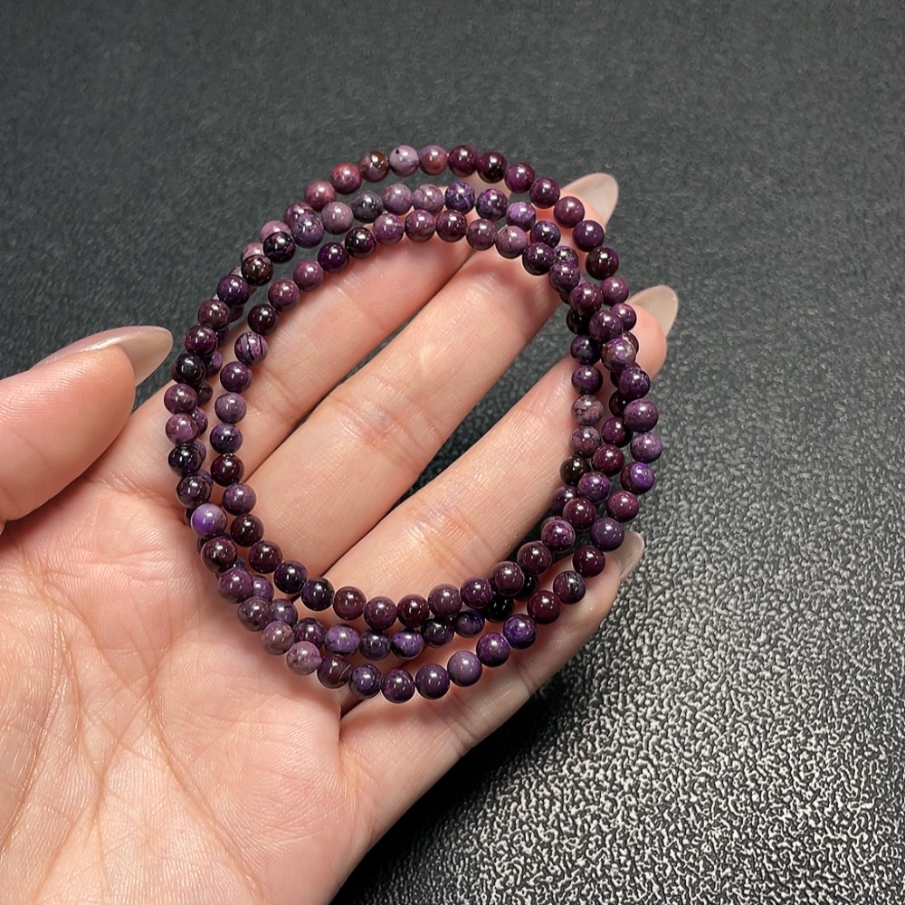 C34009644 Sugilite Bead Strand (with mineral inclusions)