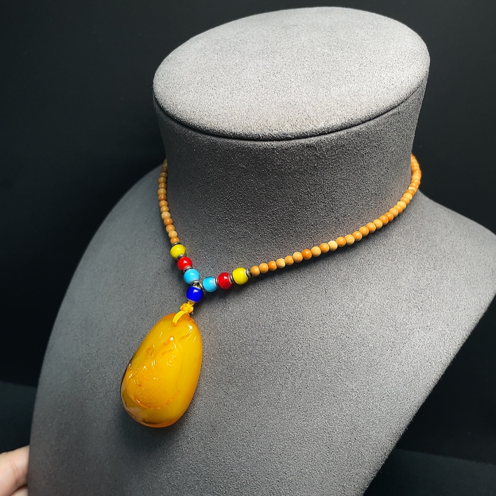 C34066888 Amber Beeswax Pendant with Colorless Coating, Total Weight Approx. 16.50g Including Chain, Chain Not Natural