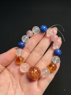 C42962584 水晶手串 仅无色、粉色 可见有机物 配石考虑非天然 货品总重约40.41克 卡11.3-18.1mm左右（杂石多）