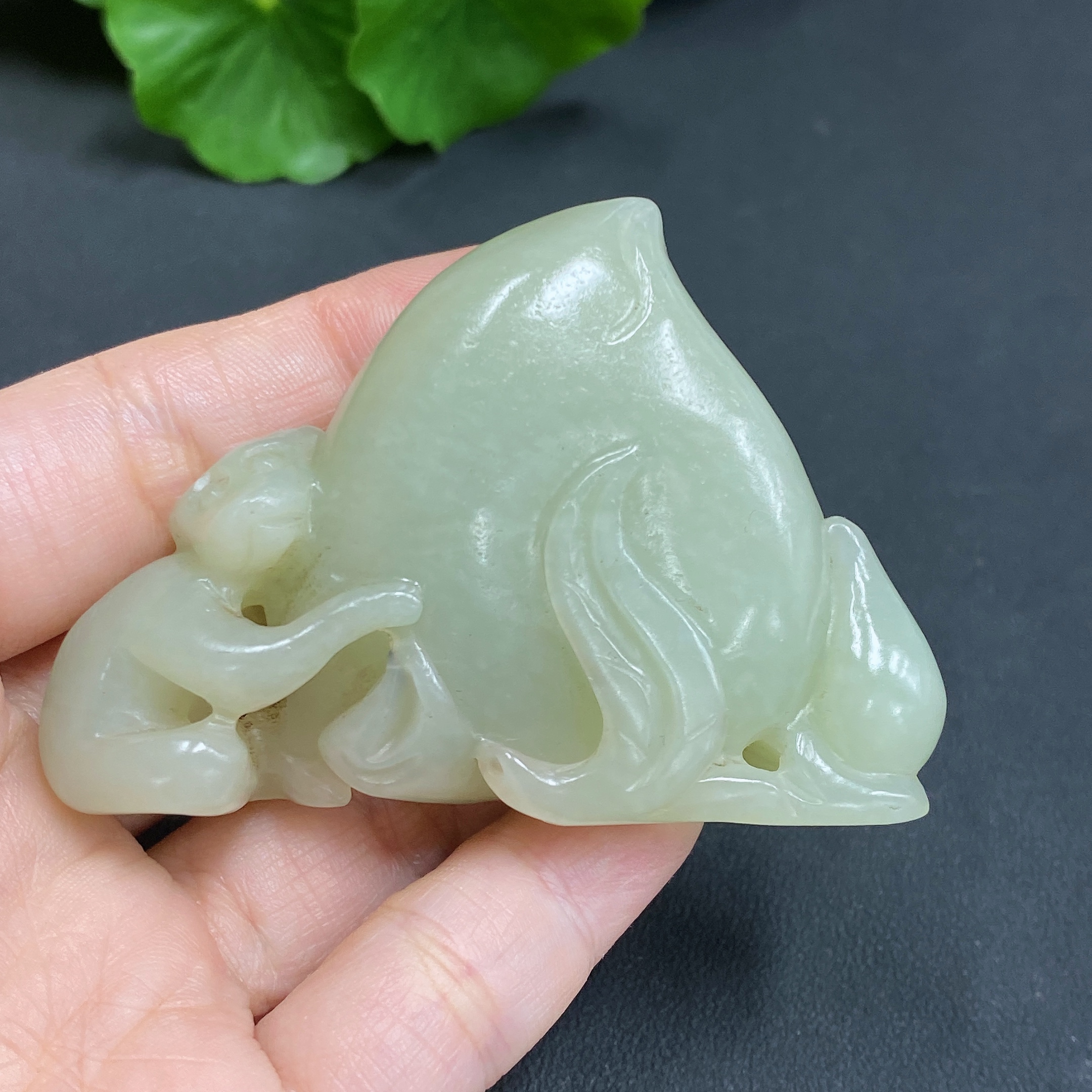 H17865316 Hetian Jade Handheld Carving - Monkey Offering Longevity