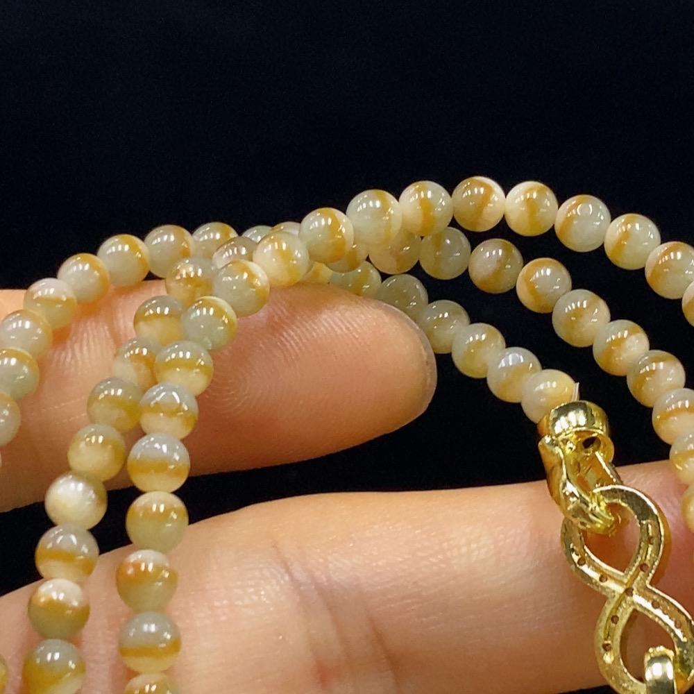 F34024094 Jadeite bead necklace, approximately 3.6mm in size, total weight about 18.79g, non-gold, yellow part color origin undetermined