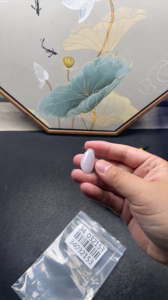 F34032153 Jadeite Fu Gua Pendant with a total weight of approximately 4.6 grams