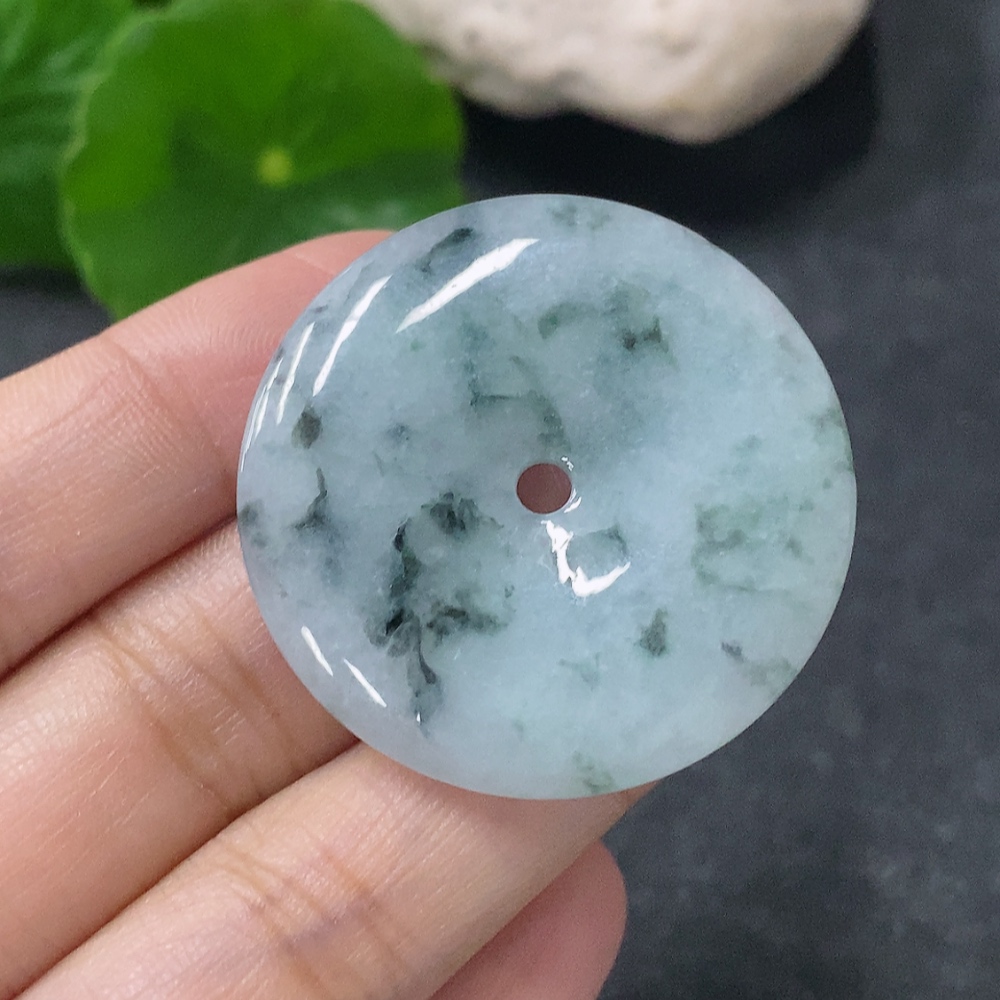 F34041946 Jadeite Pendant Peace Knot with an approximate total weight of 12.36g and containing other mineral components