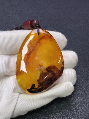 C30474274 Amber Beeswax Pendant with Partial Visible Repairs, Total Weight Approx. 16.91g Including Cord