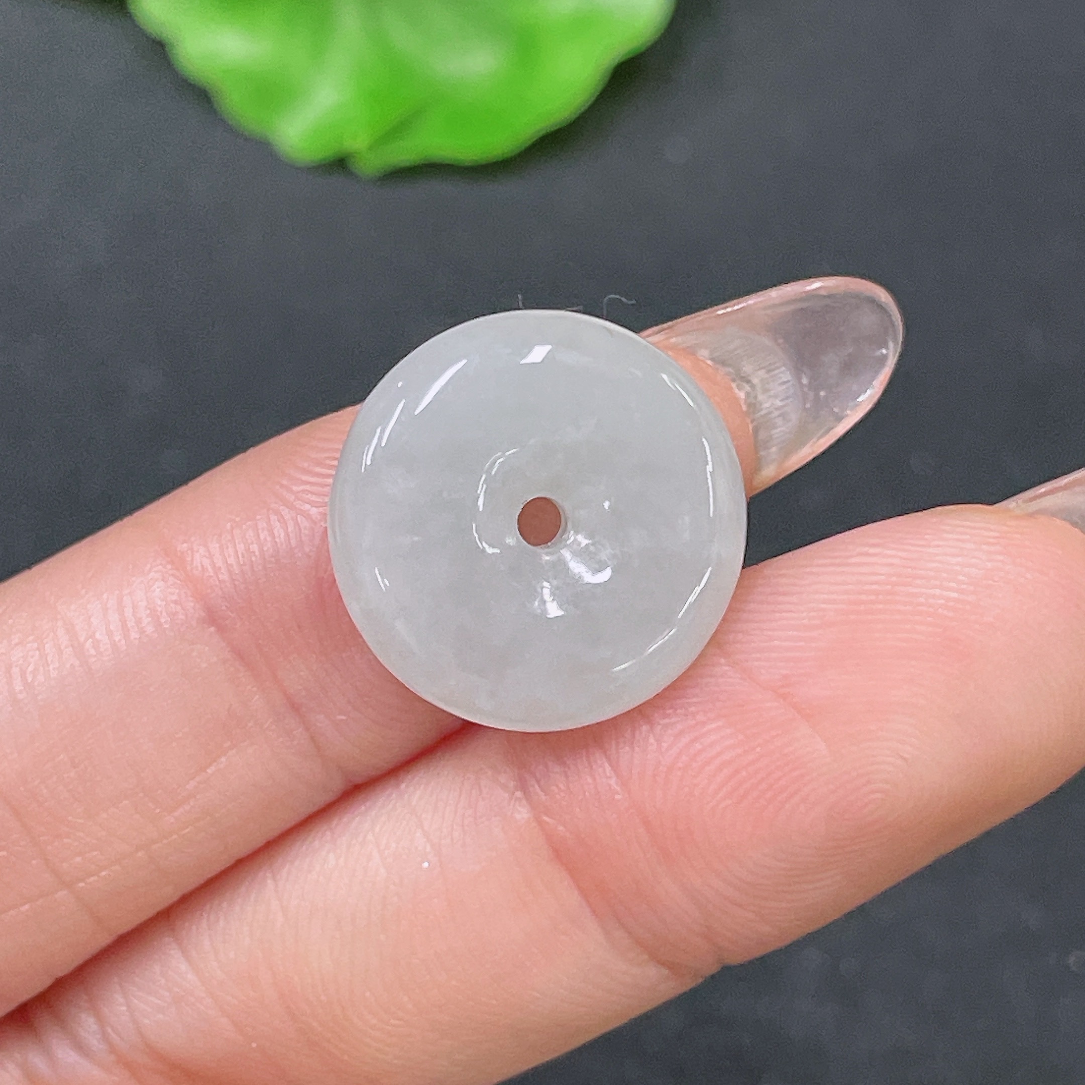 F34064356 Jadeite Peace Knot Pendant with a total weight of approximately 3 grams