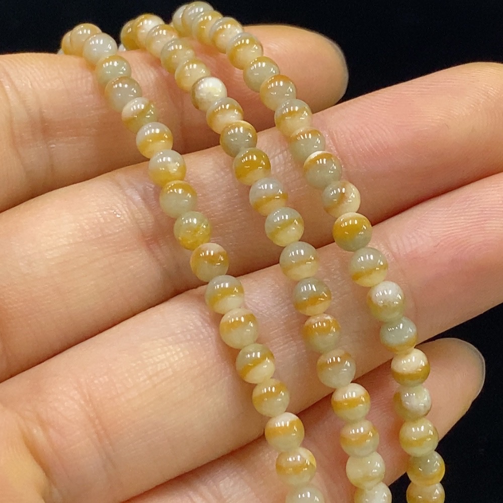 F34024094 Jadeite bead necklace, approximately 3.6mm in size, total weight about 18.79g, non-gold, yellow part color origin undetermined