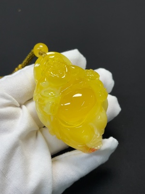 C46535466 琥珀蜜蜡挂件 非金 含绳 货品总重约44.46g