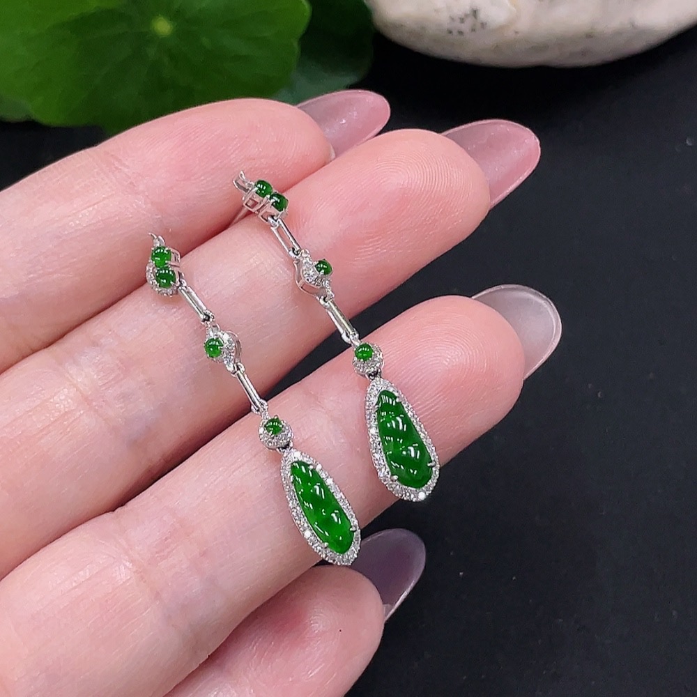 F34982006 Jadeite earrings set in 18K gold with diamonds, total weight approximately 2 grams per pair