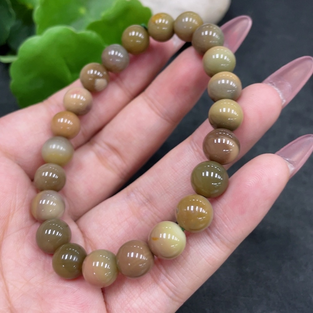 H33896539 Alashan Agate Bracelet, approx. 8.5mm beads, containing other mineral components, total weight approx. 19g