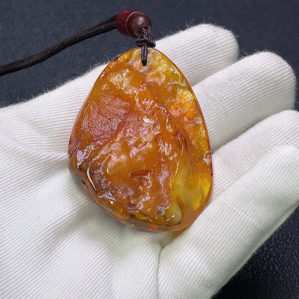 C30474274 Amber Beeswax Pendant with Partial Visible Repairs, Total Weight Approx. 16.91g Including Cord