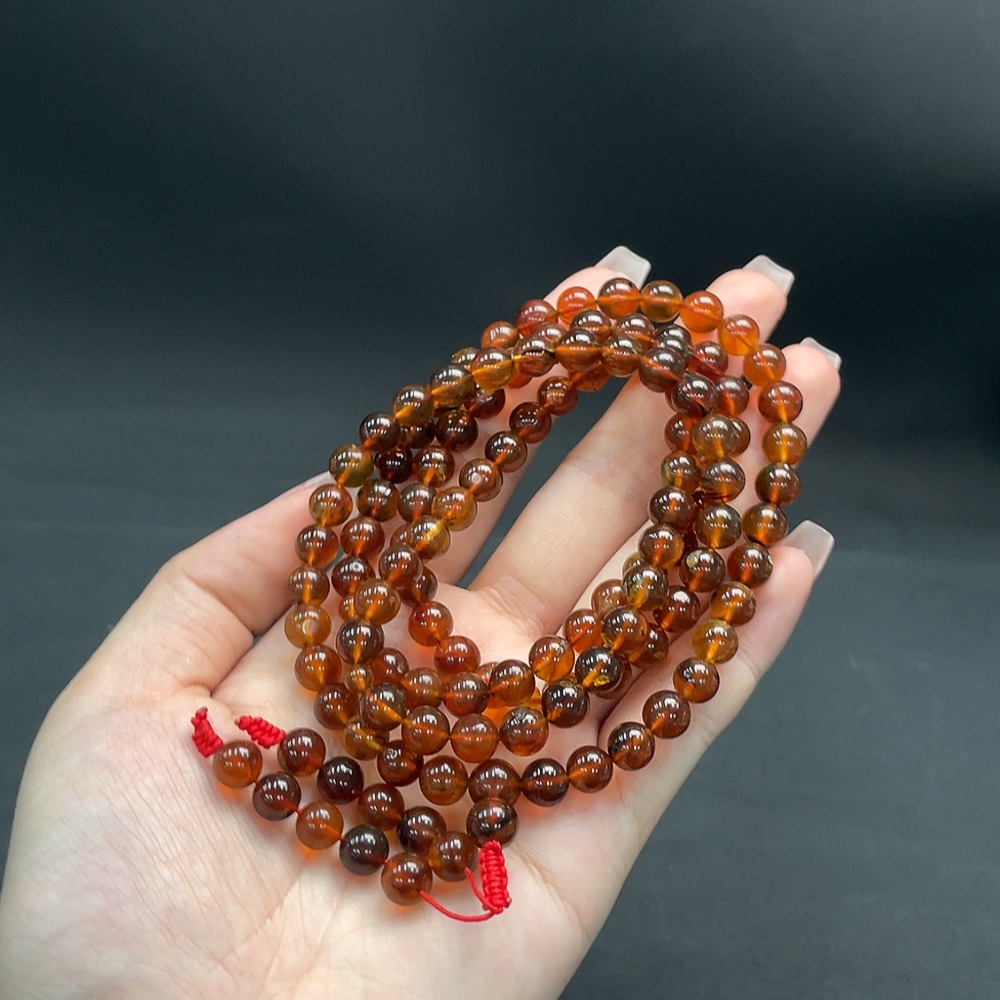 C16760810 Amber Beeswax Bead Strand Approx. 24.36g 7.3mm