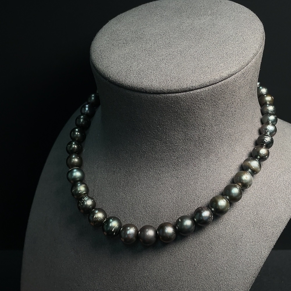 C24824292 Seawater Pearl Strand Non-Gold Setting Size 7.9-11.6mm Approx. Total Weight About 53.31g Color Origin Undetermined