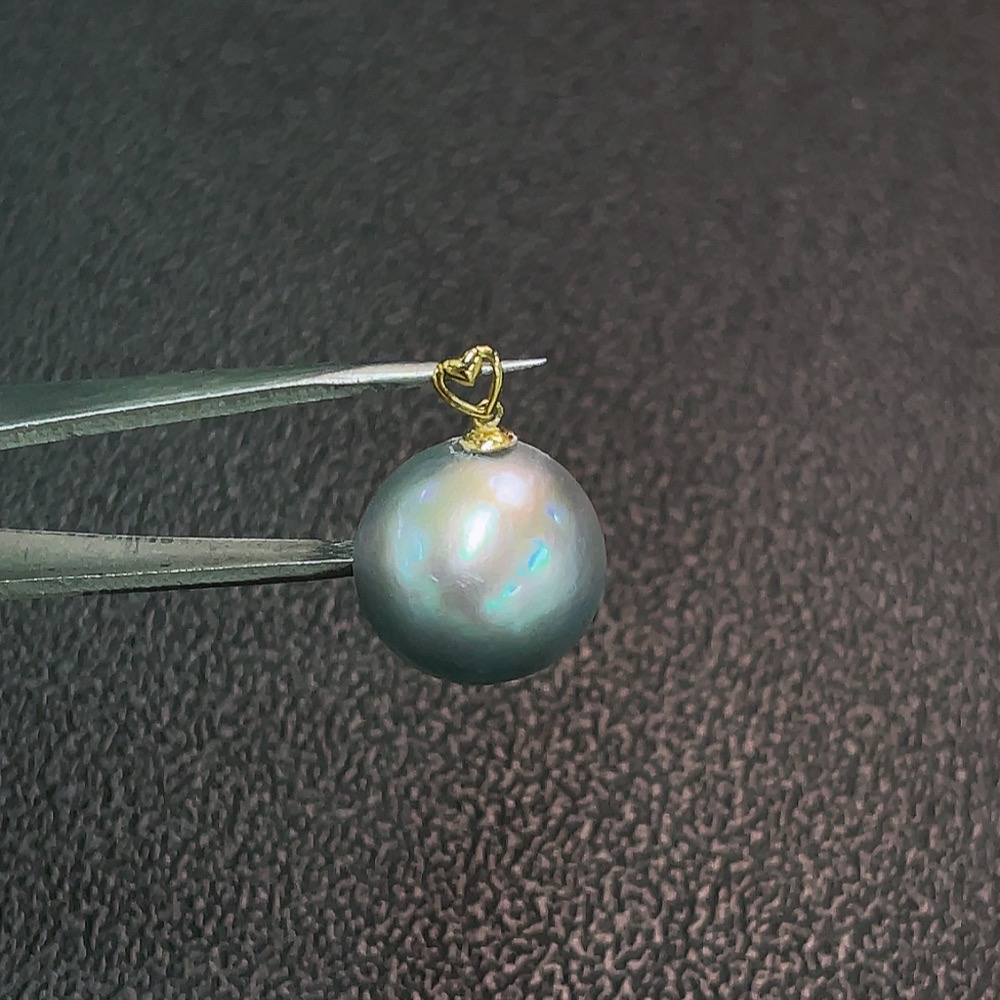 C32816889 18k combined sea water pearl pendant, color origin undetermined, total weight approximately 1.58g