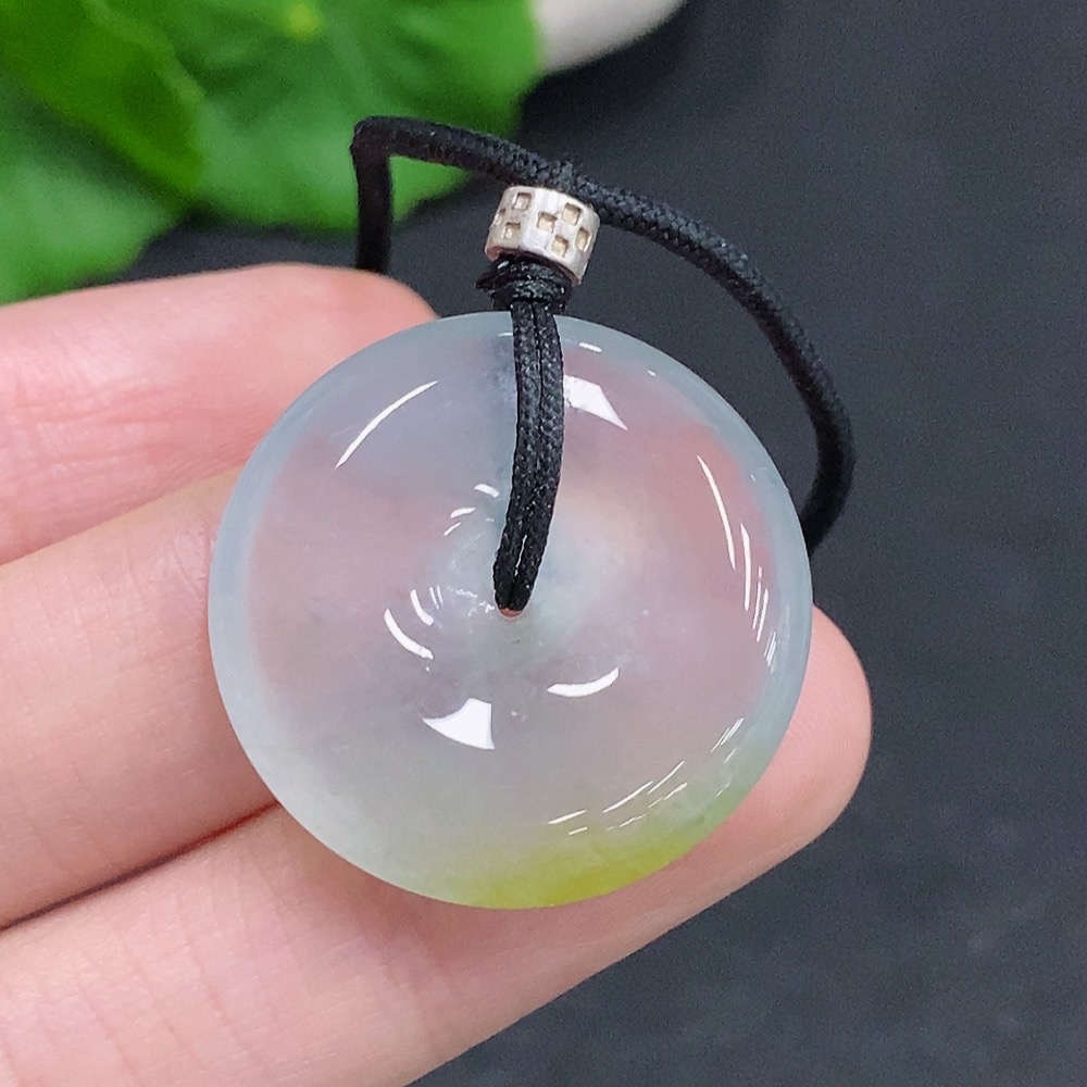 F33908119 Jadeite Peace Knot, total weight including cord approximately 10.3g