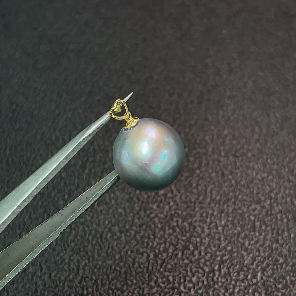 C32816889 18k combined sea water pearl pendant, color origin undetermined, total weight approximately 1.58g