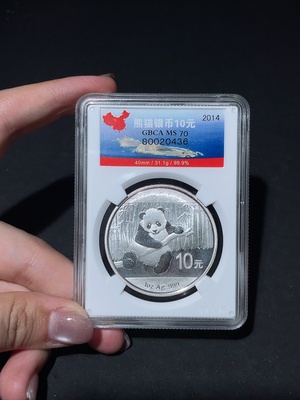 Q33937460 2014 Panda Silver Coin 1oz Pure Silver Face Value 10 Yuan with Slight Oxidation Marks