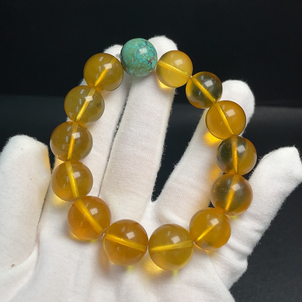 C33921132 Amber Beeswax Bracelet with Turquoise (color origin undetermined) containing other mineral components, total weight approx. 31.69g, size approx. 14.7mm