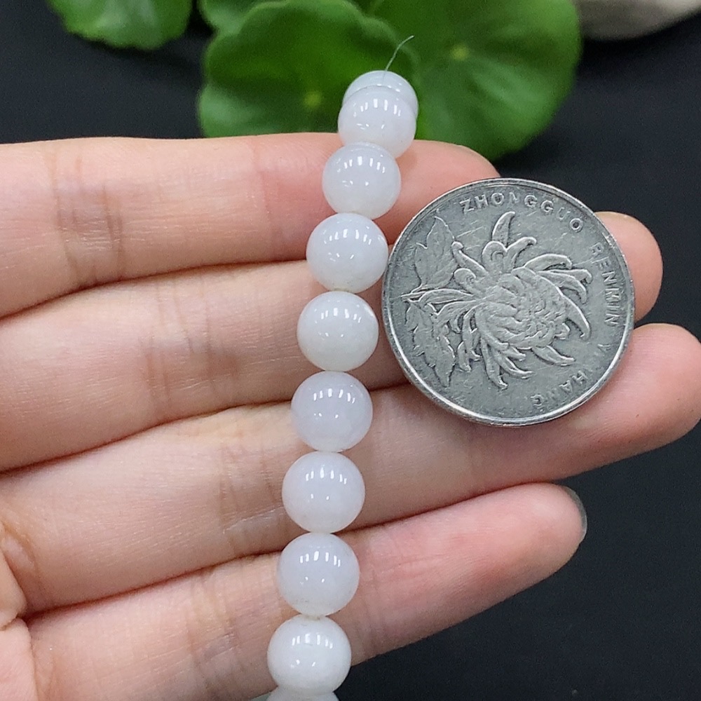 F35113955 Jadeite bracelet, approx. 7.8mm beads, total weight about 20.27g