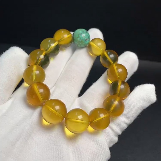 C33921132 Amber Beeswax Bracelet with Turquoise (color origin undetermined) containing other mineral components, total weight approx. 31.69g, size approx. 14.7mm
