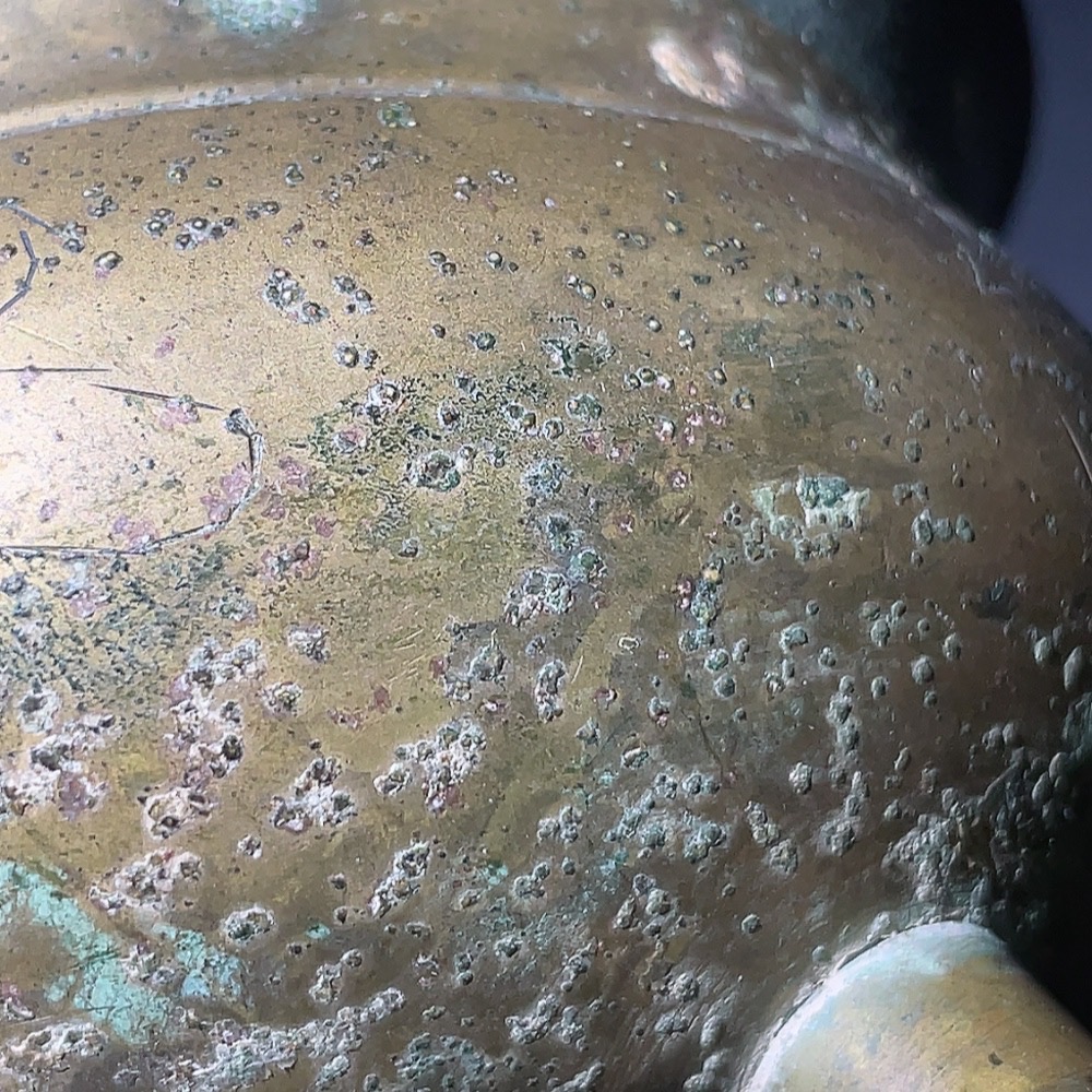W28238912 Miscellaneous Late Qing and Republic Period Three-legged Double-handled Copper Incense Burner with Floral Engravings