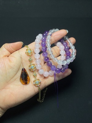 C46537974 水晶  可见有机物、托帕石  颜色成因未定、琥珀蜜蜡手链+挂件  非金  货品总重约56.72克