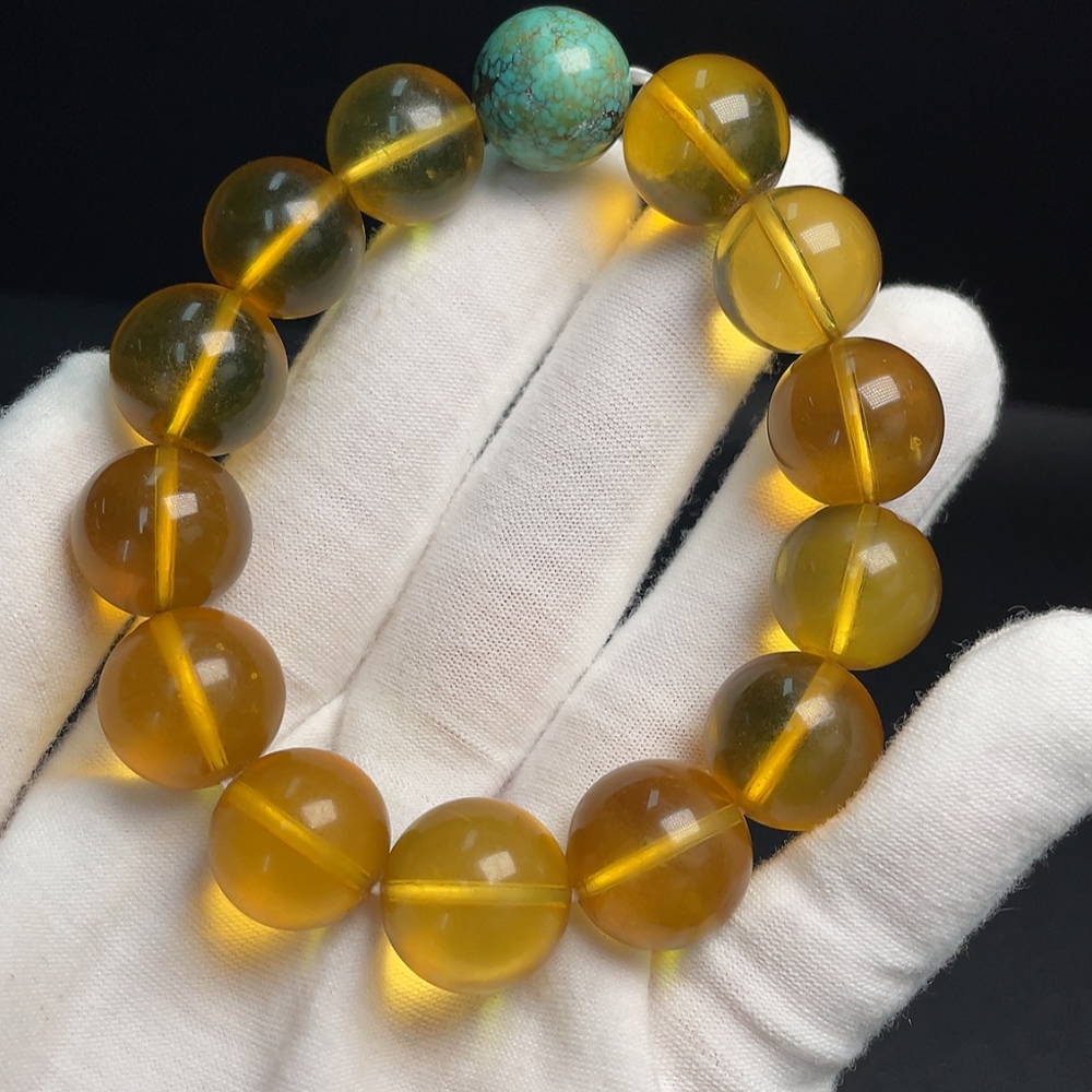C33921132 Amber Beeswax Bracelet with Turquoise (color origin undetermined) containing other mineral components, total weight approx. 31.69g, size approx. 14.7mm