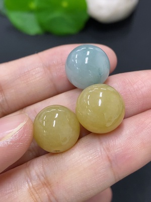 F46595225 翡翠珠子 最大卡13.3mm左右 货品总重约12.17g 颜色成因未定（黄）