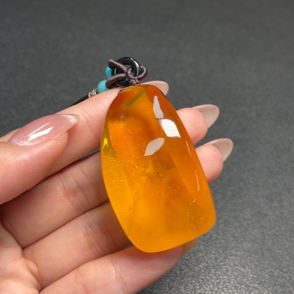 C34992979 Amber Honey Wax Pendant Non-Gold Total Weight Approx. 21.5g Including Rope