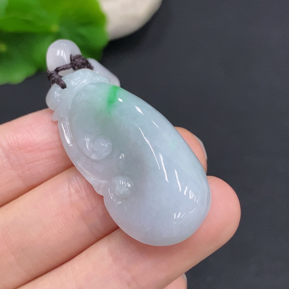 F33832095 Jadeite Ruyi Pendant Total weight approx. 13.4g (including cord weight) Matching beads not jadeite
